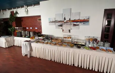 a buffet of food on a table in a room at Kadıköy Rıhtım Hotel in Istanbul