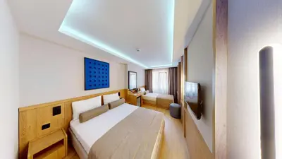a bedroom with a bed in a room at Istanbul River Hotel in Istanbul