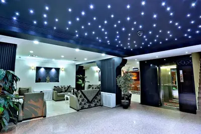 a lobby with a lot of stars on the ceiling at Budo Hotel in Istanbul