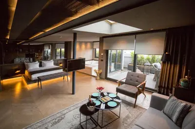 a large living room with a bed and a couch at Cityloft 81 in Istanbul