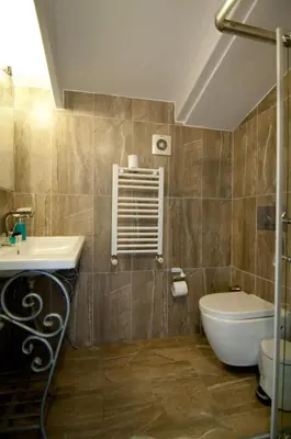a bathroom with a sink and a toilet at Agva Nehir Evi - Adult Only in Agva