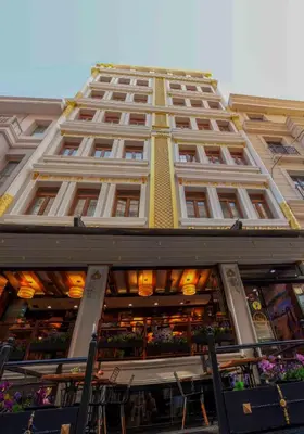 a tall building with a store in front of it at Best Nobel Hotel in Istanbul