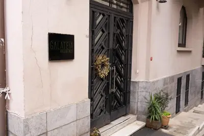 a black door on the side of a building at Galateia Residence in Istanbul