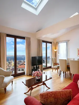 a living room with a couch and a table at Galateia Residence in Istanbul