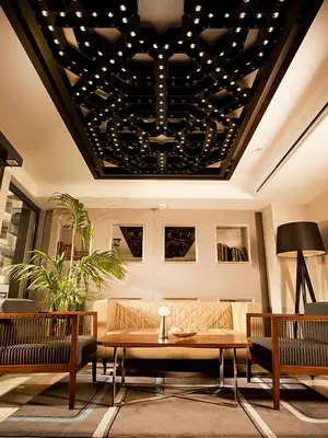 a living room with a couch and a table at Hotel La Villa in Istanbul