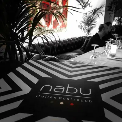 a table with a black and white table cloth on it at Nabu Hotel Karaköy in Istanbul