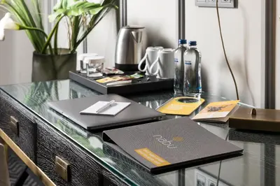 a desk with a laptop computer on top of it at Nabu Hotel Karaköy in Istanbul
