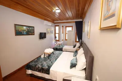 a bedroom with two beds in a room at The Trip istanbul Hotel in Istanbul