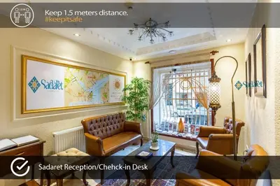 a living room with two chairs and a table at Sadaret Hotel-Old City Sultanahmet in Istanbul