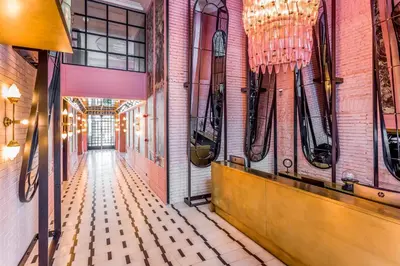 a corridor of a building with a hallway of a room at The Wings Hotels Collection in Istanbul
