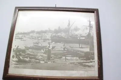a black and white photo of a harbor with boats at Ozdemir Pansiyon in Heybeliada