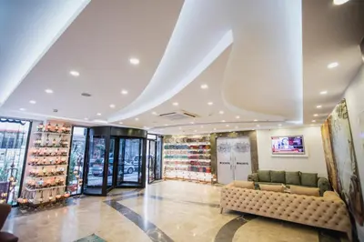 a store with a couch in the middle of a room at Royal İnci Hotel in Istanbul
