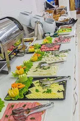 a buffet line with many different types of food at Grand Naki Hotel in Istanbul