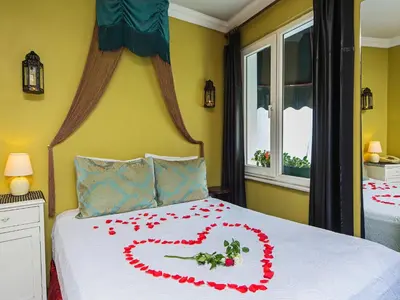 a bed with a heart made out of roses at Modern Sultan Hotel in Istanbul