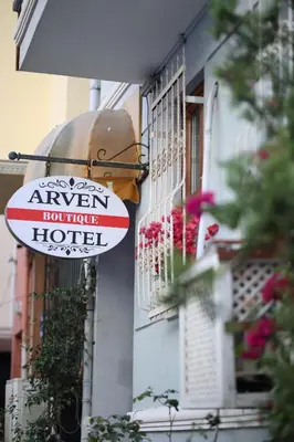 a sign for a hotel on the side of a building at Arven Hotel in Istanbul