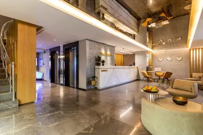a living room with a couch and a table at Hotel Venera Istanbul Old City in Istanbul