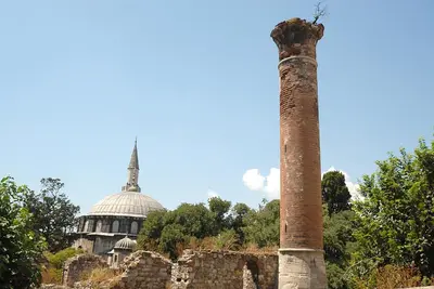 an old brick chimney with a building in the background at Ada Hotel Istanbul in Istanbul