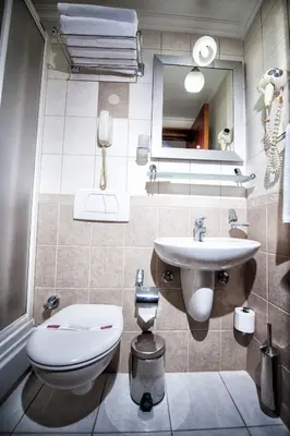 a bathroom with a toilet and a sink at Hotel Centrum Istanbul in Istanbul