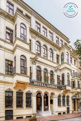 a large white building with a hotel amrar at Amber Hotel & Spa in Istanbul