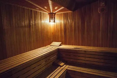 a wooden sauna with a light on top of it at Bilek Istanbul Hotel in Istanbul