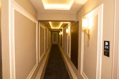 a corridor of a hotel with a hallwayngth at Martinenz Hotel in Istanbul