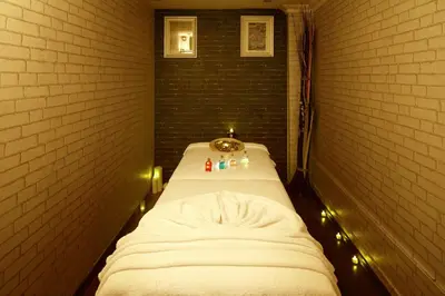 a small room with a bed with lights in it at Grand Halic Goldenhorn in Istanbul