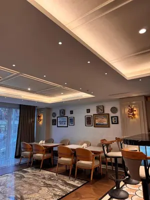 a dining room with tables and chairs in a room at Grand Hilarium Hotel in Istanbul