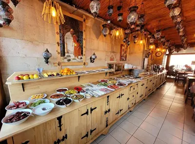 a buffet line with many plates of food at Saruhan Hotel in Istanbul