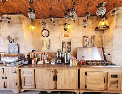 a kitchen with a counter and a stove in it at Saruhan Hotel in Istanbul