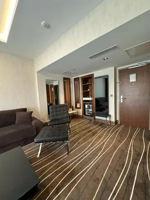 a living room with a couch and chairs in it at Cihangir Hotel Bosphorus in Istanbul