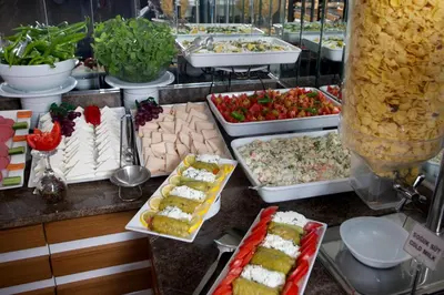 a buffet with many different types of food on a counter at Aspen Hotel & SPA Istanbul Old City in Istanbul