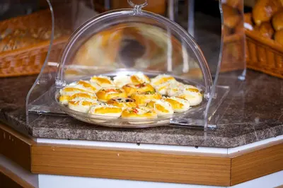 a plate of food in a plastic container on a counter at Aspen Hotel & SPA Istanbul Old City in Istanbul