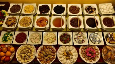 a display case filled with lots of different types of food at Agora Life Hotel - Special Class in Istanbul