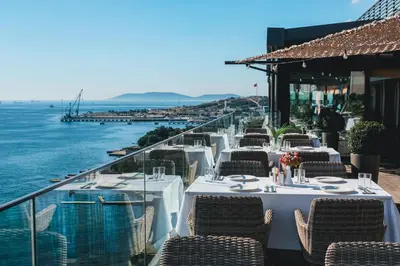 a restaurant with a view of the ocean at Holiday Inn Istanbul - Tuzla Bay by IHG in Istanbul