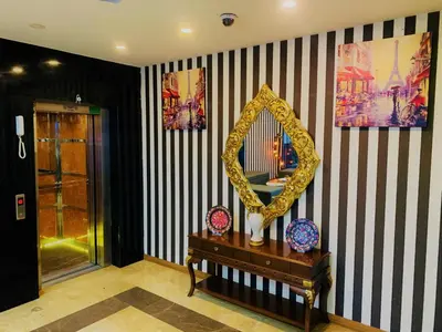 a room with a mirror and a wooden table at Express İnci Hotel in Istanbul