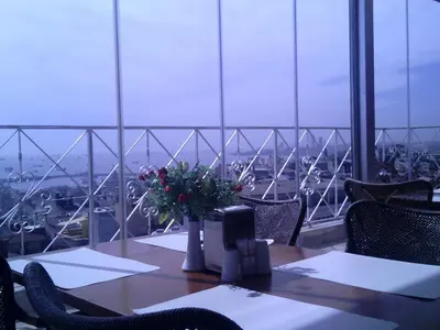 a table with flowers on top of a building at Hotel Linda in Istanbul