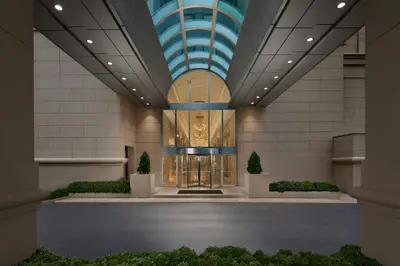 a lobby of a building with a glass ceiling at Sheraton Istanbul Levent in Istanbul