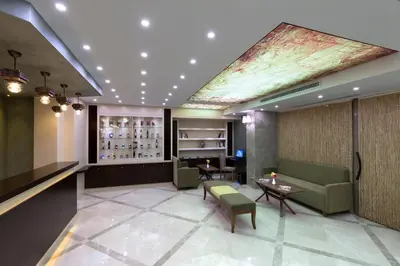 a hotel lobby with a couch and a table at Regard Hotel in Istanbul