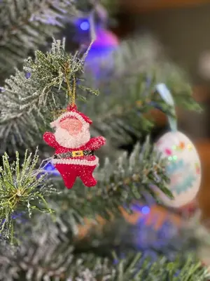 a christmas tree with a santa claus ornament at Hotel Aksaray istanbul in Istanbul
