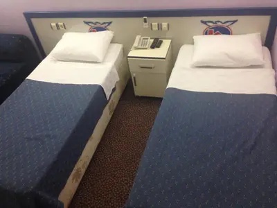 two beds in a hotel room with at Hotel Akkus in Istanbul