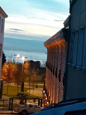 a truck parked in front of a building with lights at Golden Life Apart Hotel in Istanbul