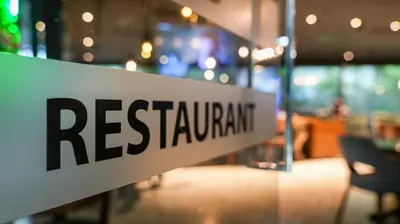 a sign that says restaurant on a glass door at Milord Hotel in Istanbul