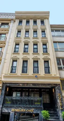 a large building with a sign on the front of it at Homelike Hotel in Istanbul