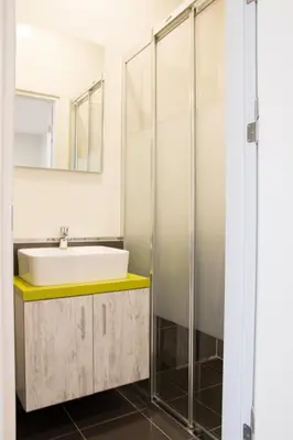 a bathroom with a sink and a mirror at Zin D Home Dudullu Otel in Istanbul