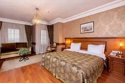 a hotel room with a bed and a couch at Ferman Hotel Old City -Special Category in Istanbul