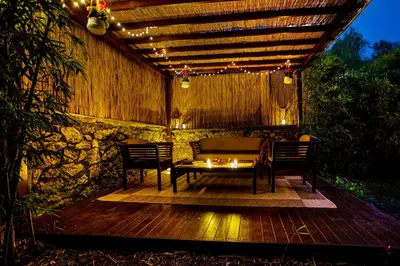 a patio with a table and chairs under a pergola at NOA - Sungu 1 in Istanbul