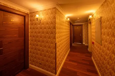 a hallway with a walk in shower in a house at Golden Dream Otel in Istanbul