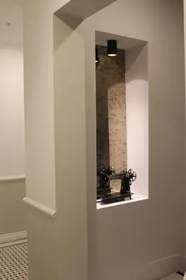 a bathroom with a mirror on a wall at Hotel Naumpasa Konagi in Istanbul