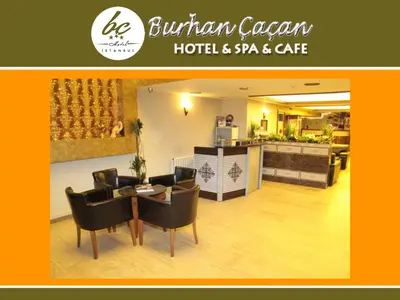 a living room with a table and chairs and a kitchen at BC Burhan Cacan Hotel & Spa & Cafe in Istanbul