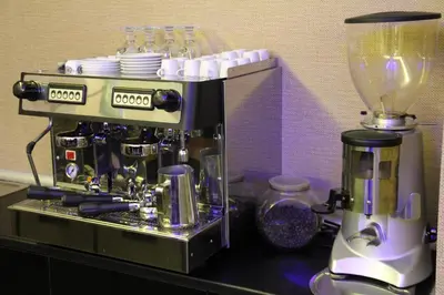 a coffee machine sitting on top of a counter at Airport Residence in Istanbul